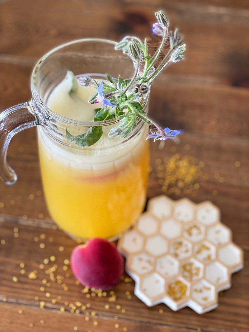 Fresh peach and honey lemonade in a glass