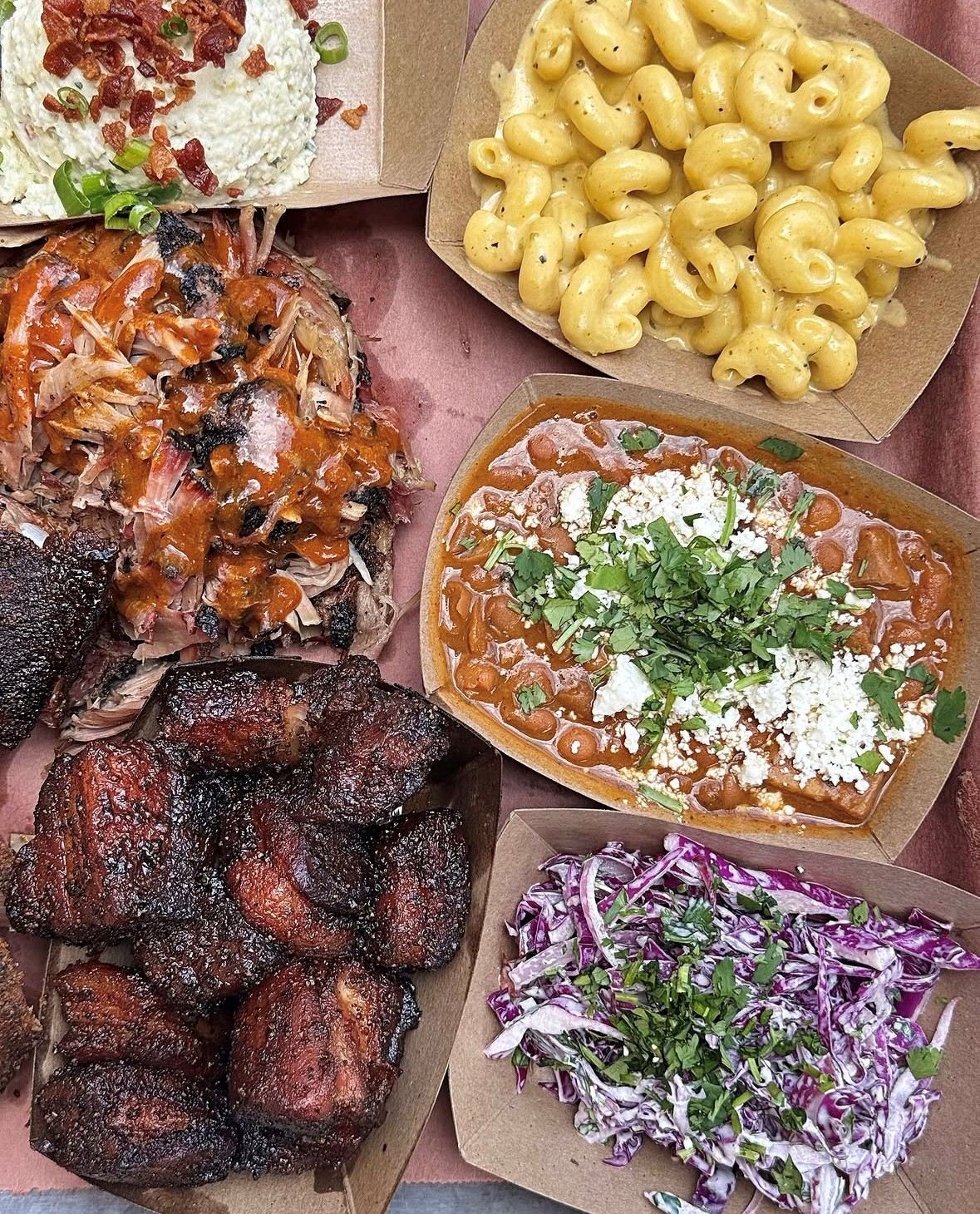 Hurtado Barbecue smoked sides — mac and cheese, pinto beans, coleslaw